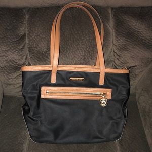 Brown and black Michael kors bag